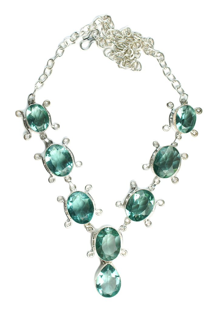 photo of green gemstone encrusted silver-colored link necklace