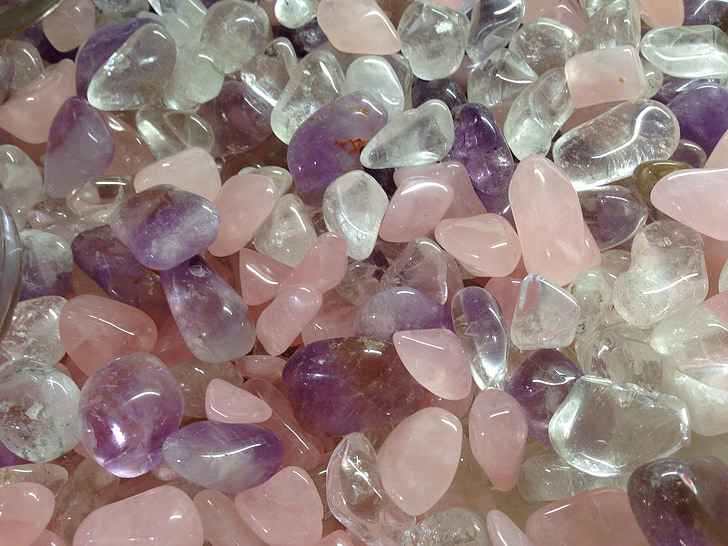 closeup photo of pink, clear, and purple beads