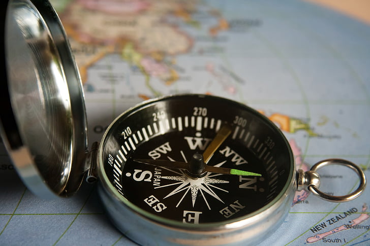 silver-colored compass