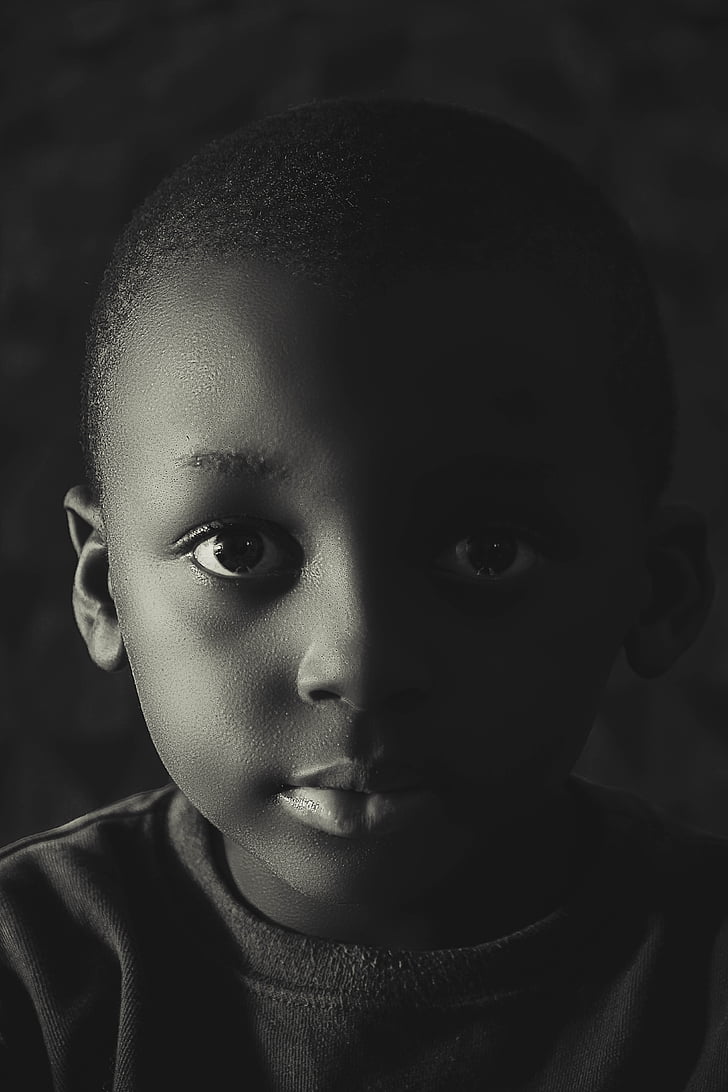 grayscale portrait photography of child