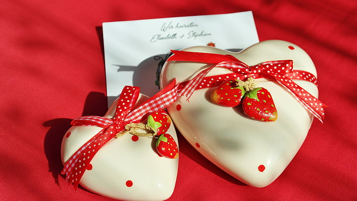 two white-and-red hearts strawberries gifts
