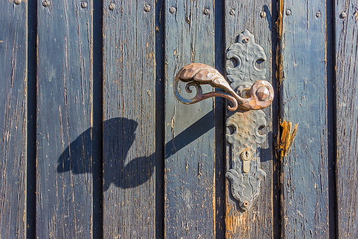 brown metal door lever
