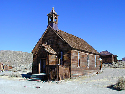 brown chapel near house