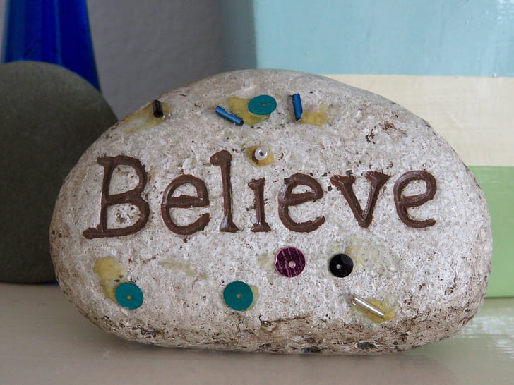 stone with believe carving and paint