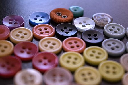 macro photography of assorted buttons