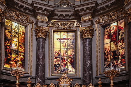 photo of religious paintings inside church