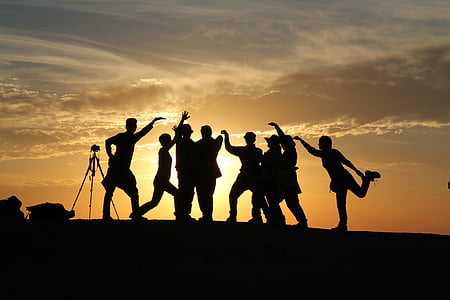 silhouette photo of group of people