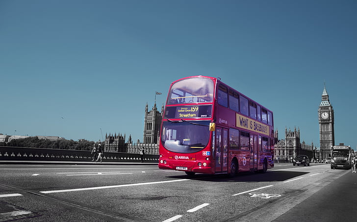 red double-decker bus on road