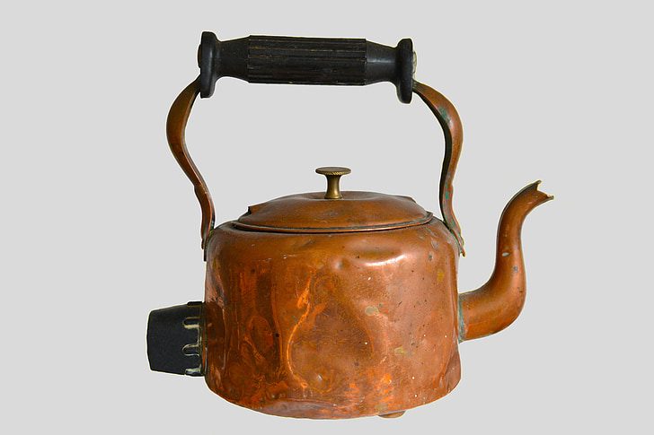 antique brass-colored kettle