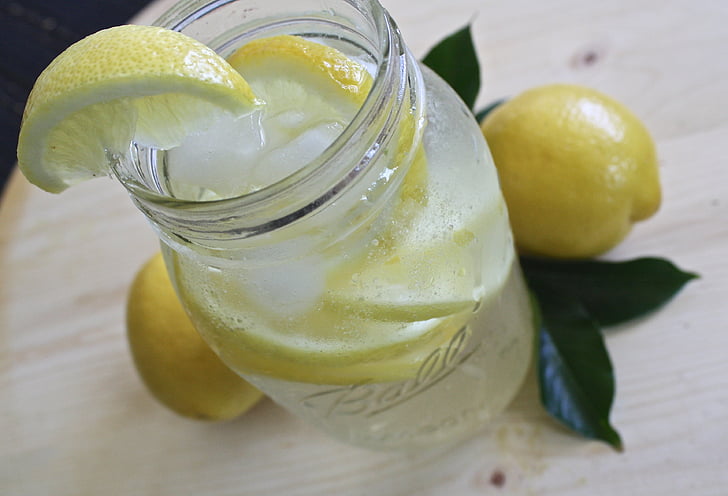 lemon wedges in clear glass mason jar