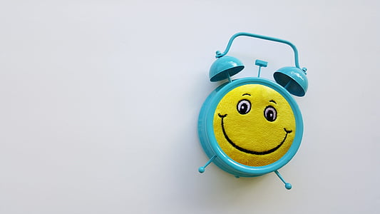 blue smiley alarm clock