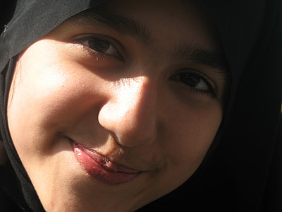 woman wearing black hijab headdress