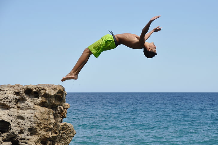 Royalty-Free photo: Time lapse photography of man jumping off the cliff |  PickPik