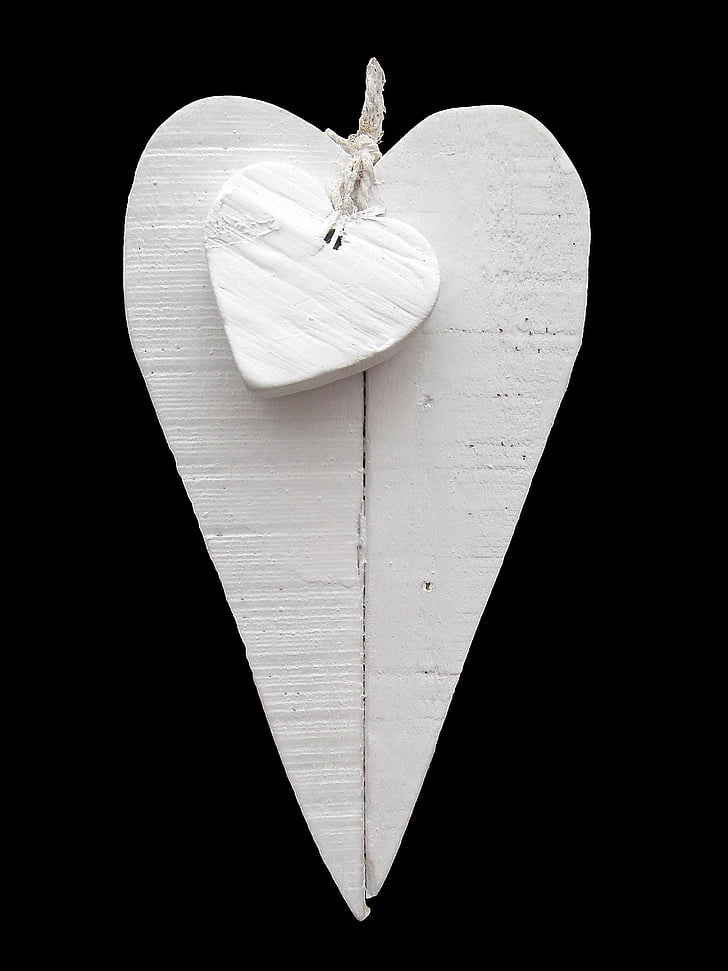 heart pendant against black background