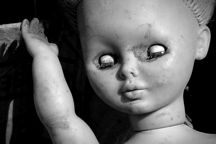 greyscale photo of doll