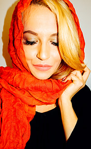 closeup photo of woman wearing red headscarf
