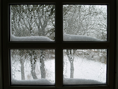 minimalist photography of snow on glass window