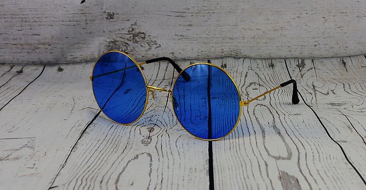 blue sunglasses with gold frames