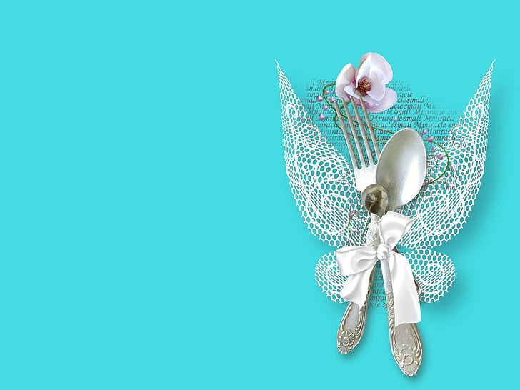 spoon and fork with white ribbon