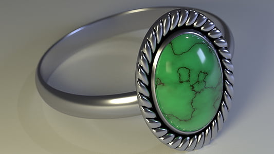 green jeweled silver-colored ring