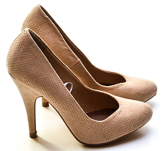 pair of brown heeled shoes