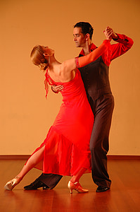 man and woman dancing