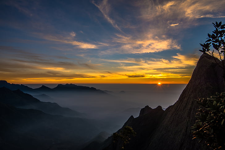 bird's eye photography of mountain during sunrise