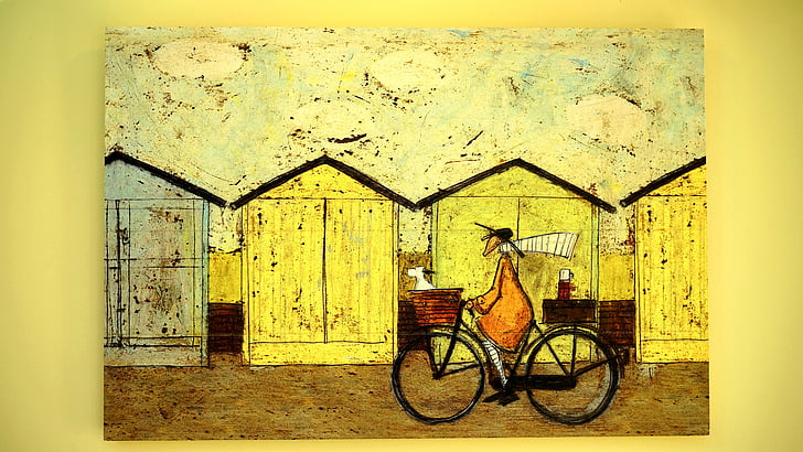 photo of person riding bicycle painting