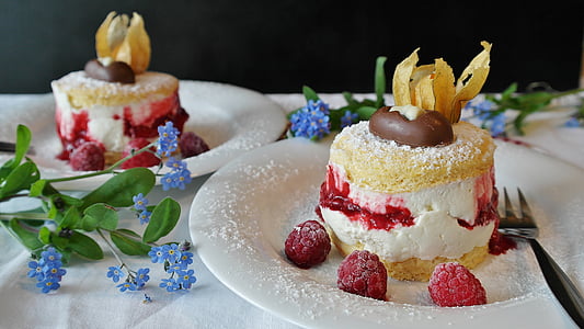 two cakes with chips and strawberries