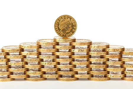 stacked gold-colored coins
