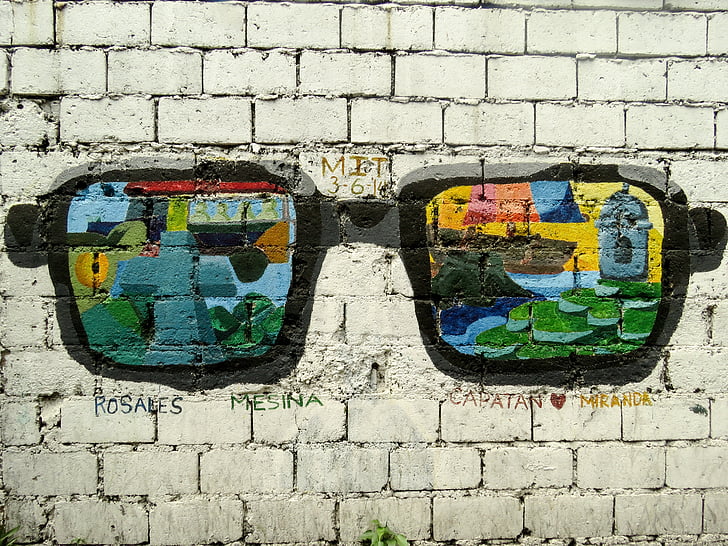 black framed multicolored sunglasses painting