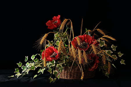 red flowers on basket