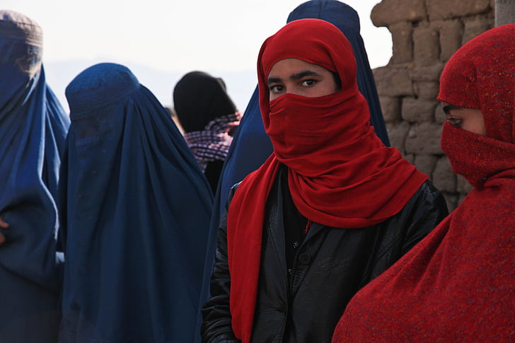 woman wearing red-and-blue hijab headscarfs