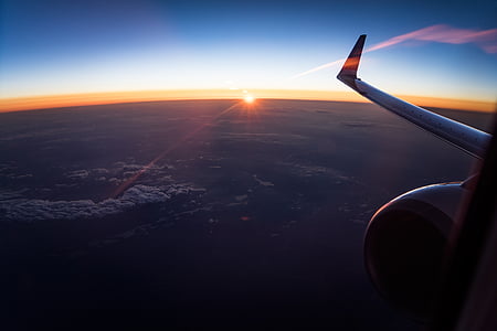 airplane wing during sunset