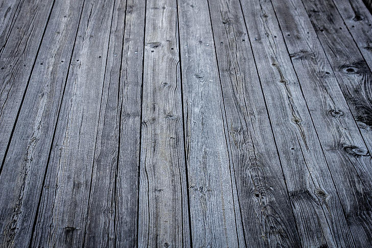 closeup photo of gray parquet floor