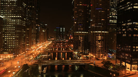 city of high-rise buildings during nighttime