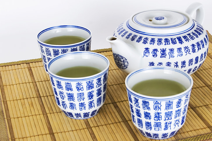 white-and-blue ceramic tea set
