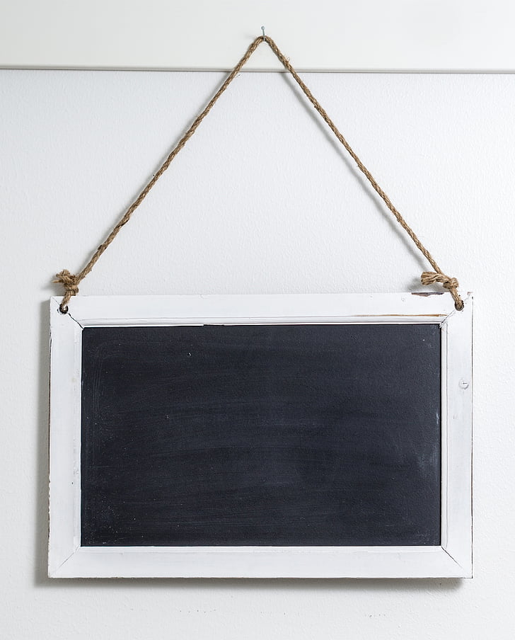 rectangular white framed blackboard