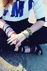 woman wearing candy bracelets