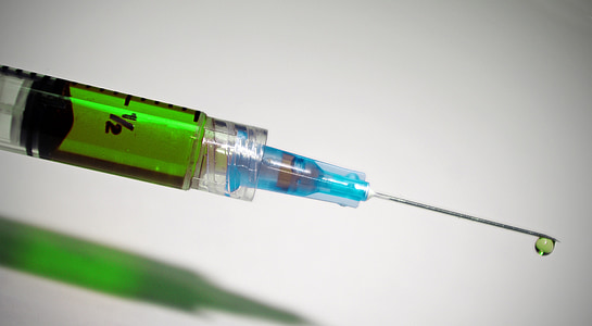 closeup photo of syringe