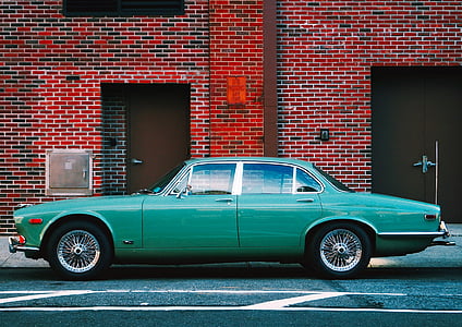 photography of green sedan