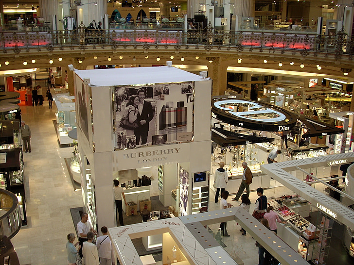 view of Burberry store with lots of people passing by