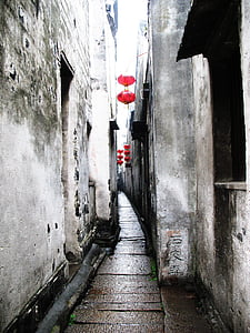 selective photo red lanterns on pathway
