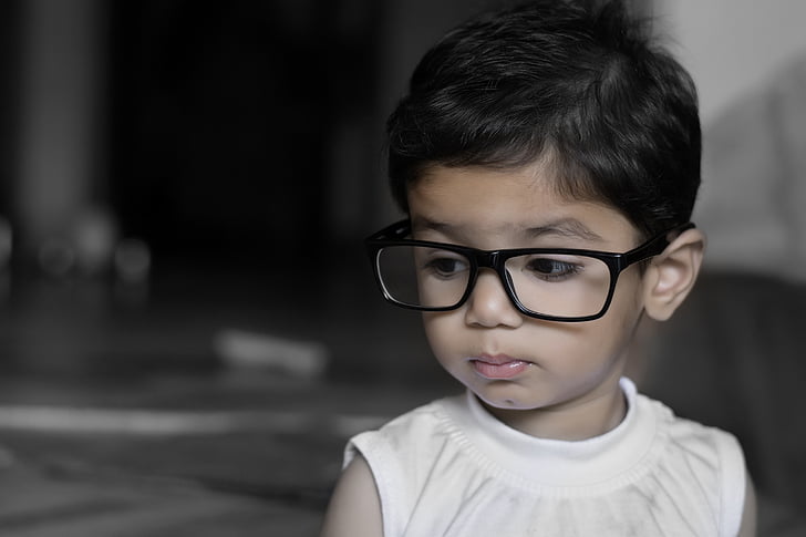 baby wearing eyeglasses