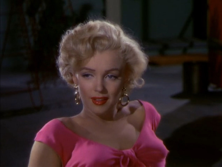 Marilyn Monroe with pink cap-sleeved shirt