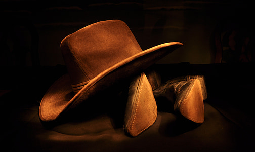 brown cowboy hat and boots