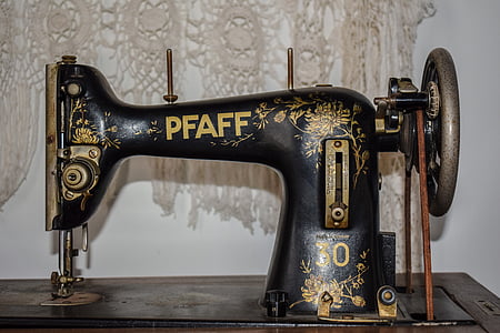black and yellow Pfaff sewing machine