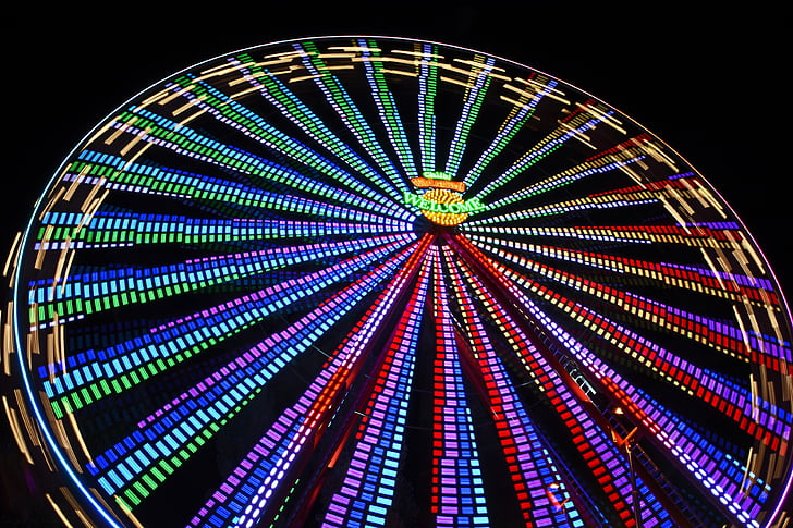 time-lapse photo of Ferris wheel with multicolored LED lights