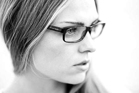 woman wearing black framed eyeglass