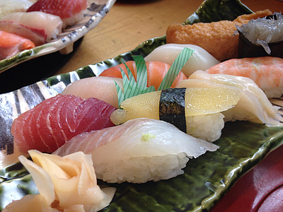 platter of sashimi and sushi